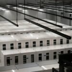 Rows of server cabinets in a modern data center